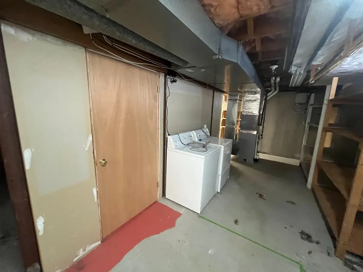 Starting Point: An unfinished basement used only for laundry and storage